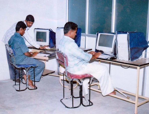 Students using computers in a computer facility